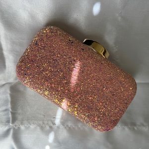 Pink sparkly clutch purse